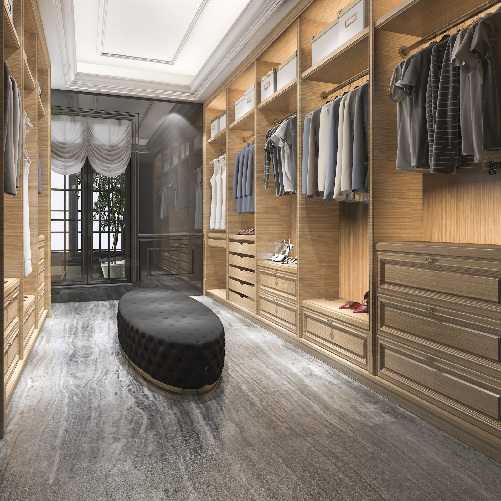 Dressing sur mesure en bois clair avec tiroirs, penderies et assise centrale.